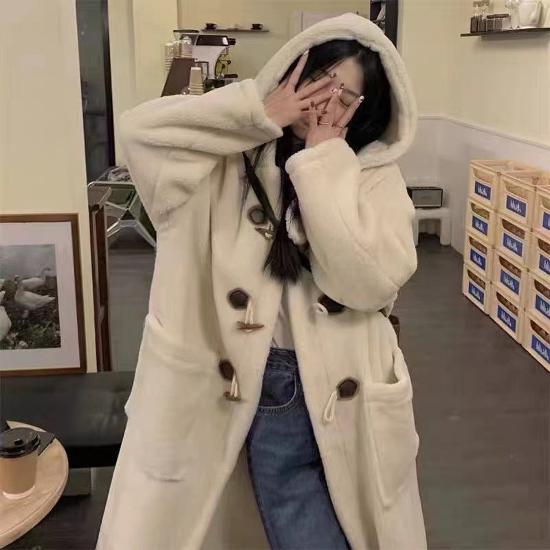 Lamb fleece coat with hood, toggle buttons and pattern