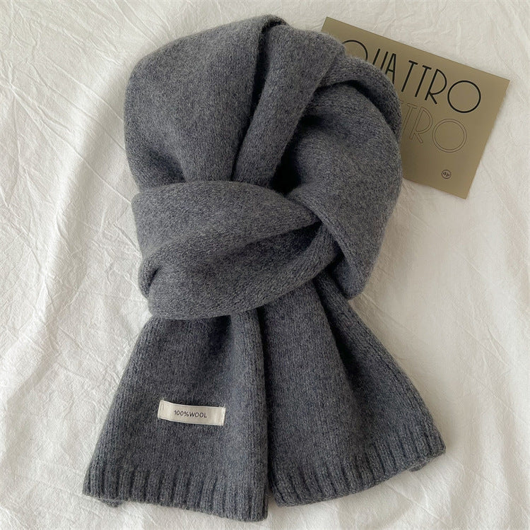 Simple knitted scarf made of pure wool