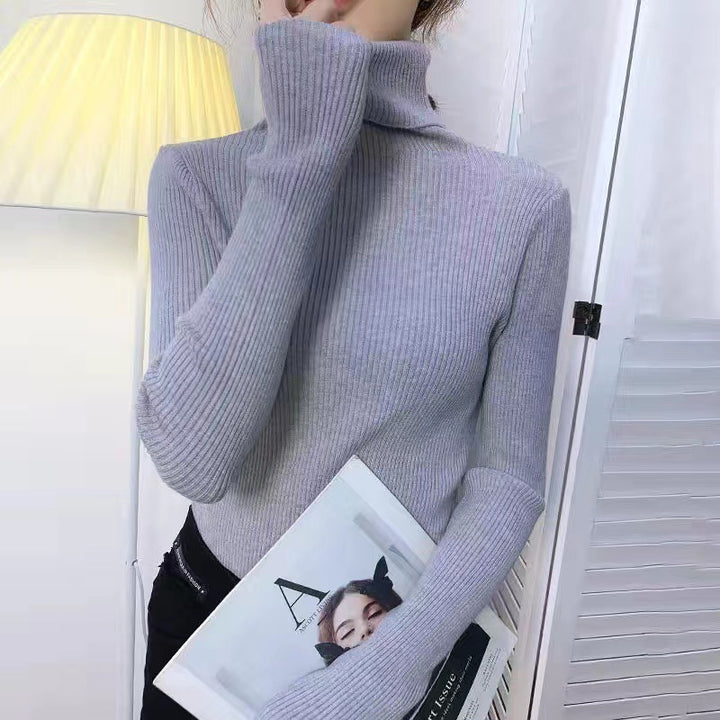 Form-fitting women's turtleneck sweater
