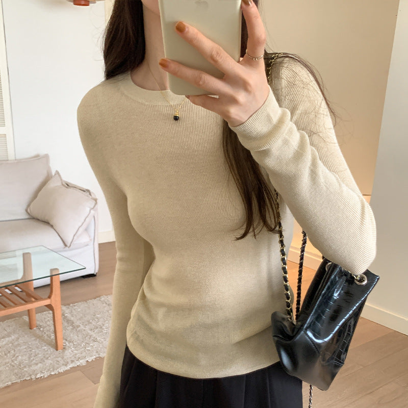 Women's knitted pullover, round neck, long sleeved, fitted