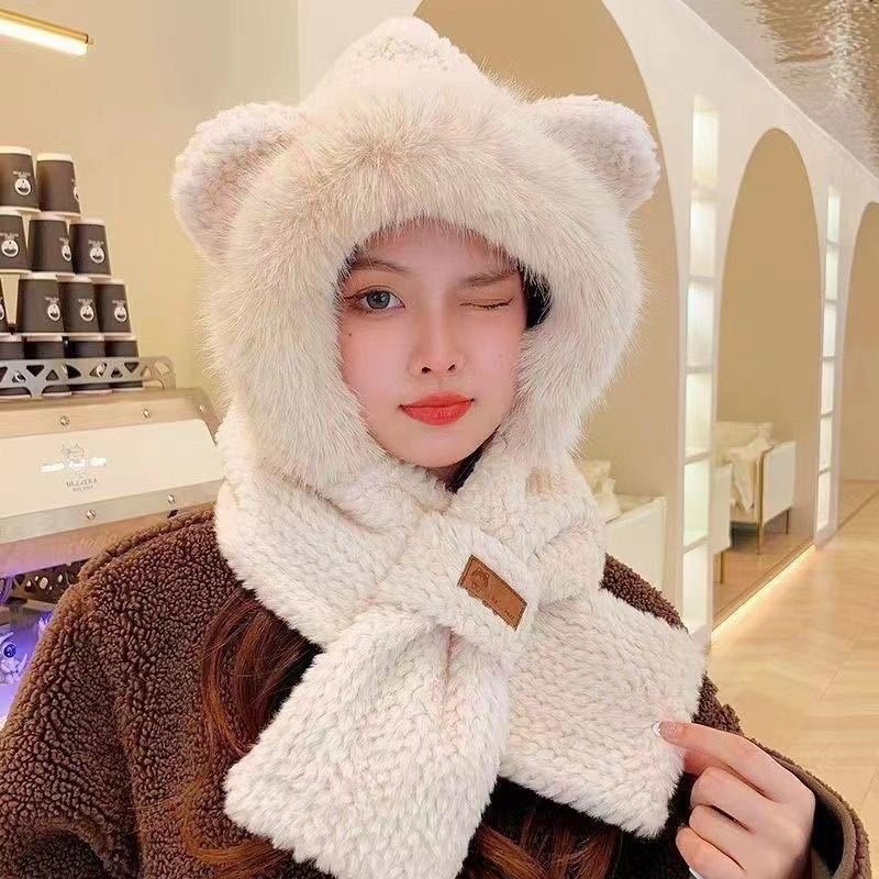 Fluffy set consisting of hat with fox ears and scarf