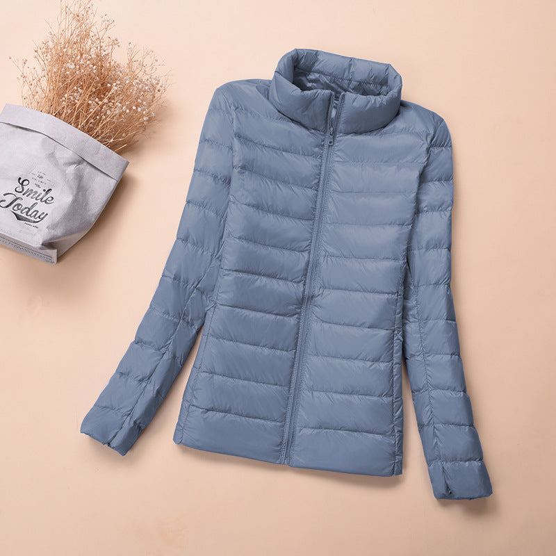 Light women's down jacket, short, with white duck down