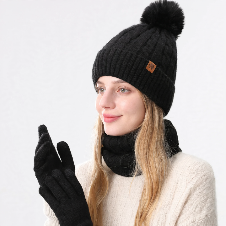 Winter set consisting of knitted hat, scarf, and gloves