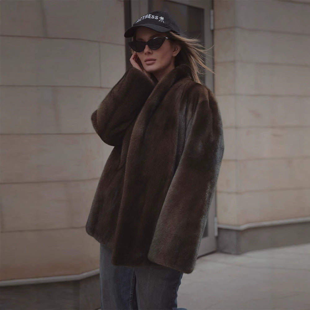 Loose women's faux fur coat in brown