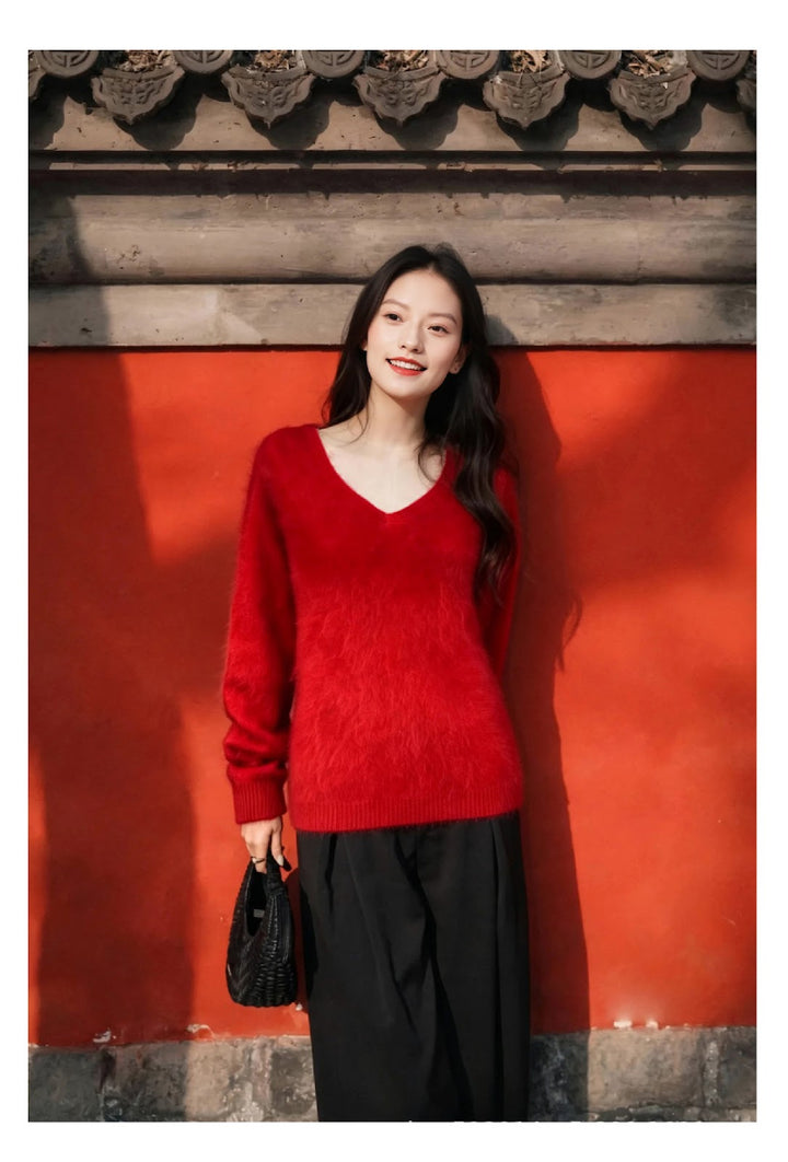 Women's knit sweater made of wool blend with V-neck