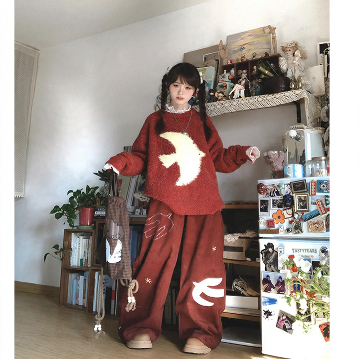 Women's knit sweater with bird jacquard