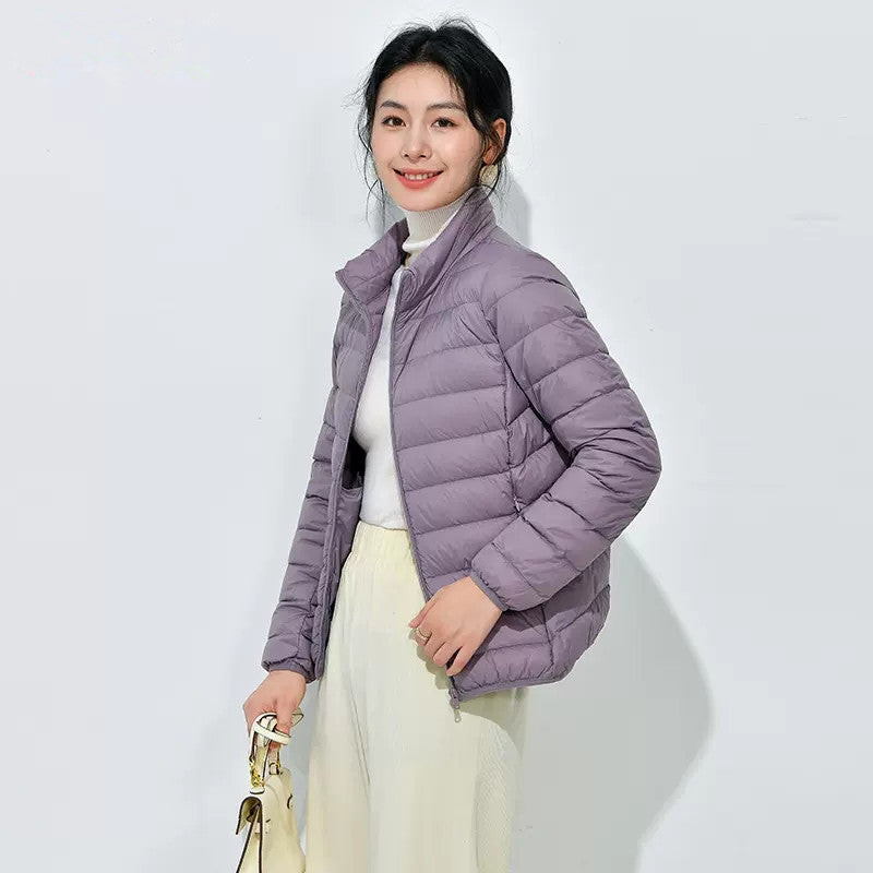 Light women's down jacket with stand-up collar, white duck down
