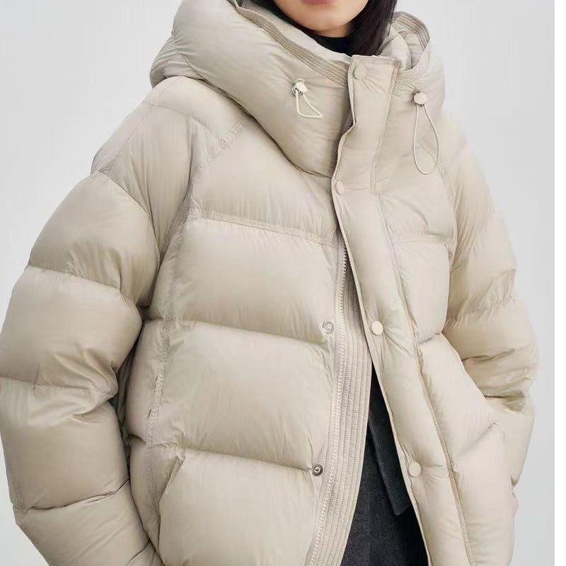 Short women's down jacket with duck down filling