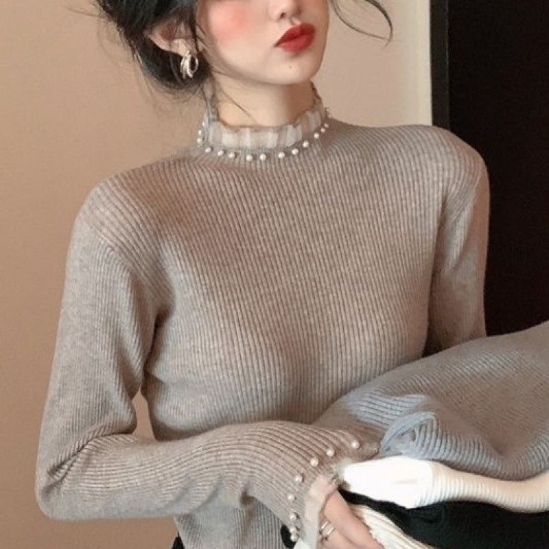 Ladies' knitted sweater with stand-up collar, lace and pearls