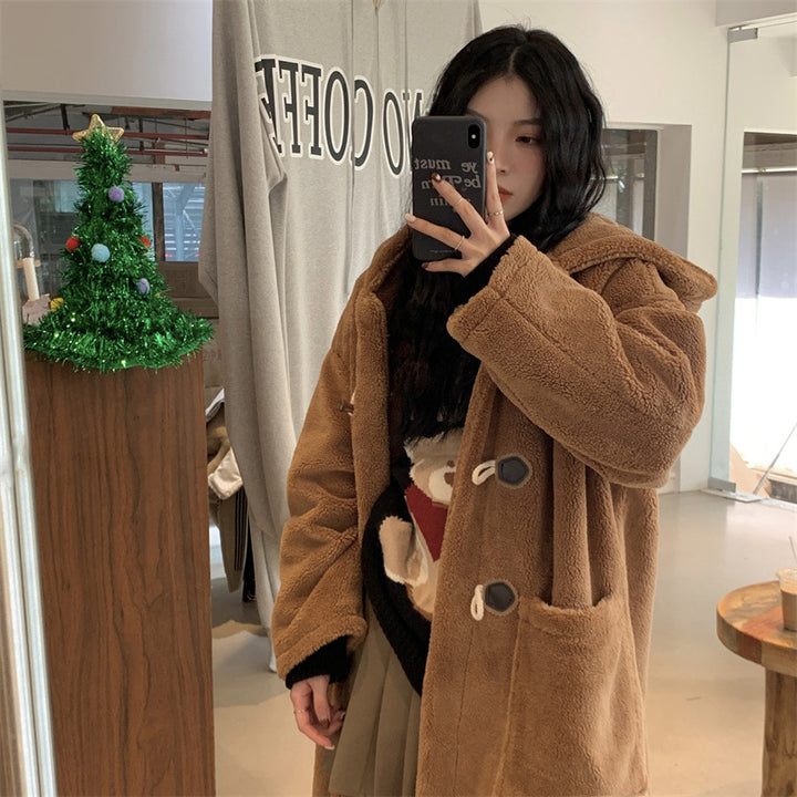Mid-length women's winter coat with toggle buttons