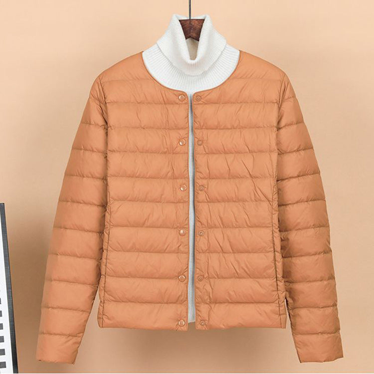 Lightweight, short down jacket as a base layer