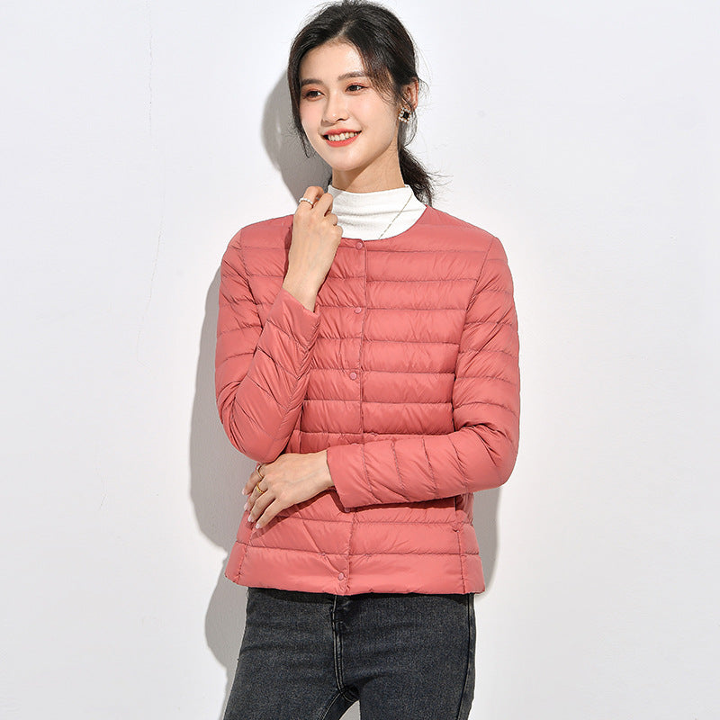 Light women's down jacket, short, as a base layer jacket