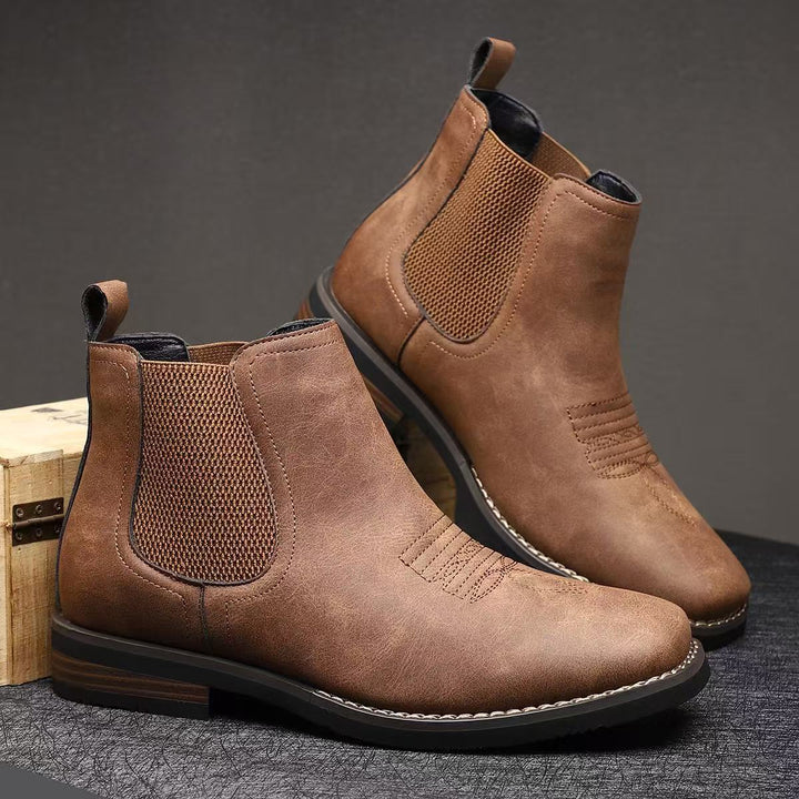 Classic men's Chelsea boots made of synthetic leather