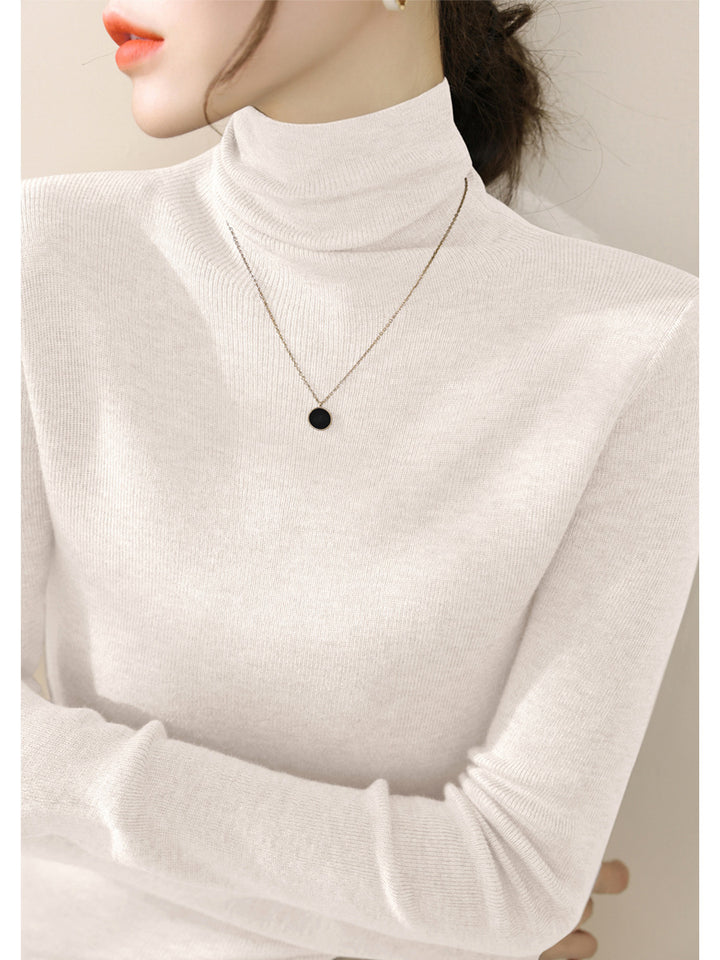 Women's knitted sweater, fitted, with stand-up collar