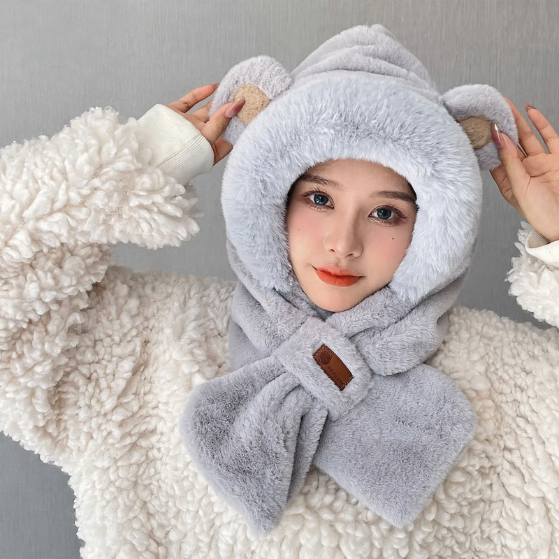 Fluffy set consisting of hat with fox ears and scarf