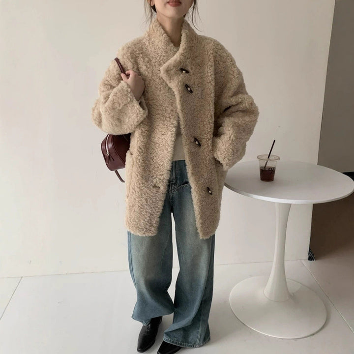 Wool coat with stand-up collar and toggle buttons