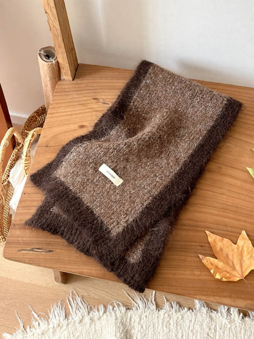 Warm scarf in various shades of brown