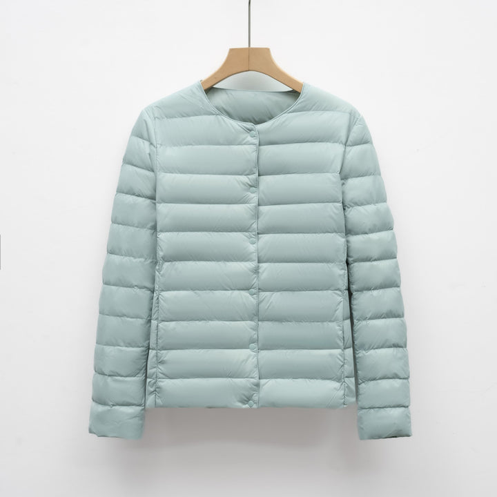 Light women's quilted jacket with round neckline
