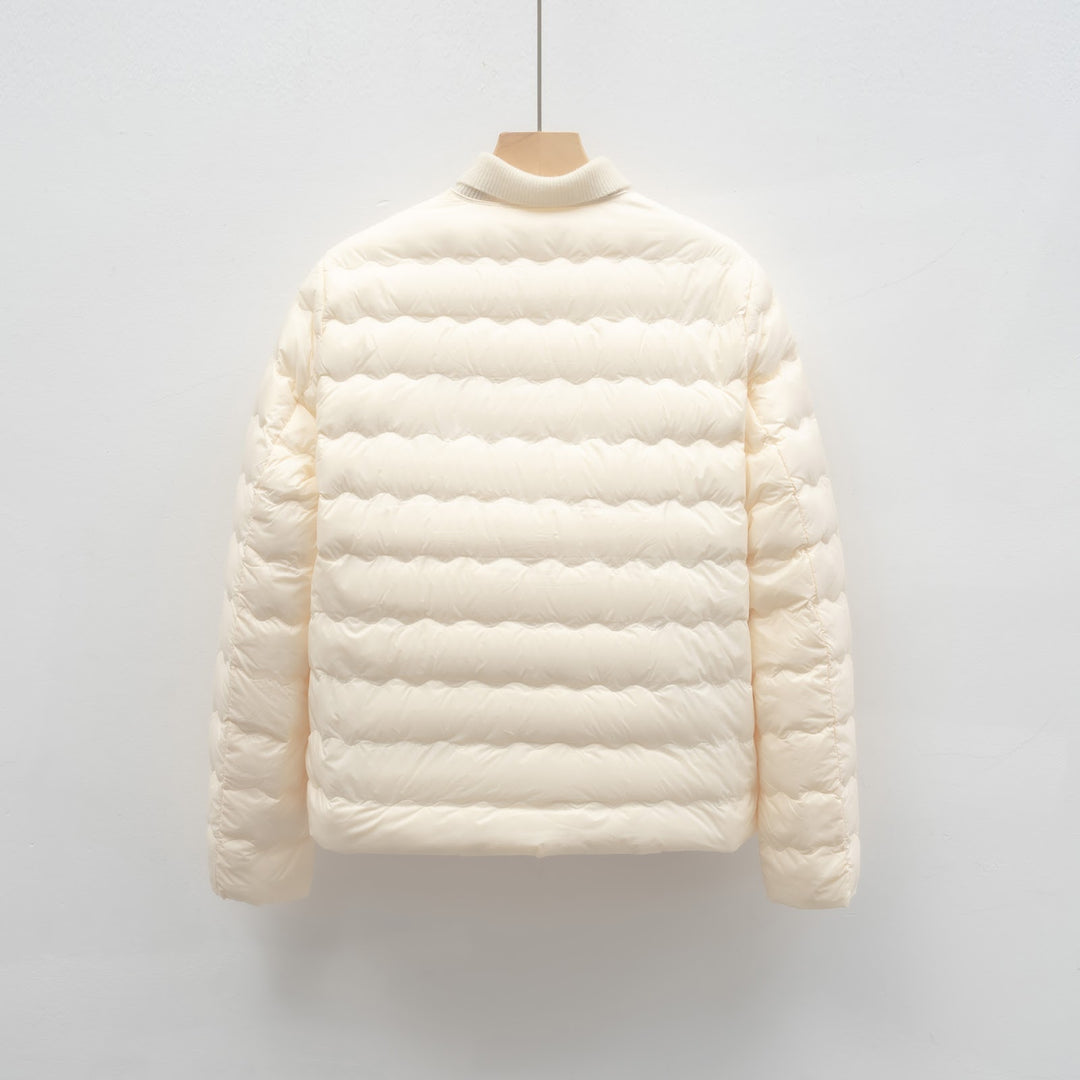 Light women’s down jacket with round neck and wave pattern