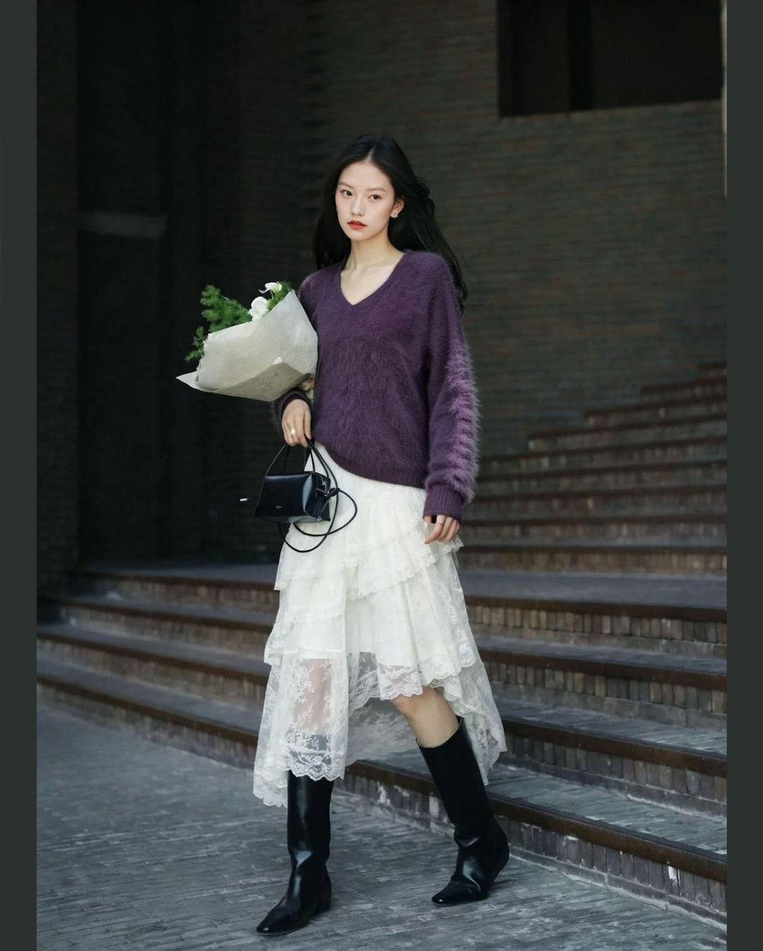 Women's knit sweater made of wool blend with V-neck