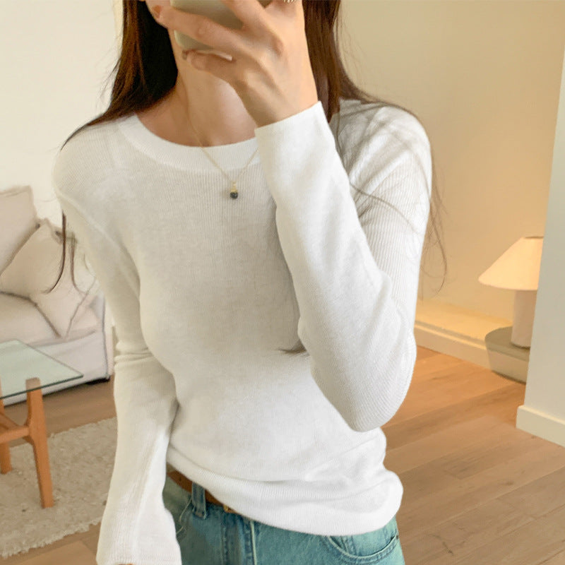 Women's knitted pullover, round neck, long sleeved, fitted