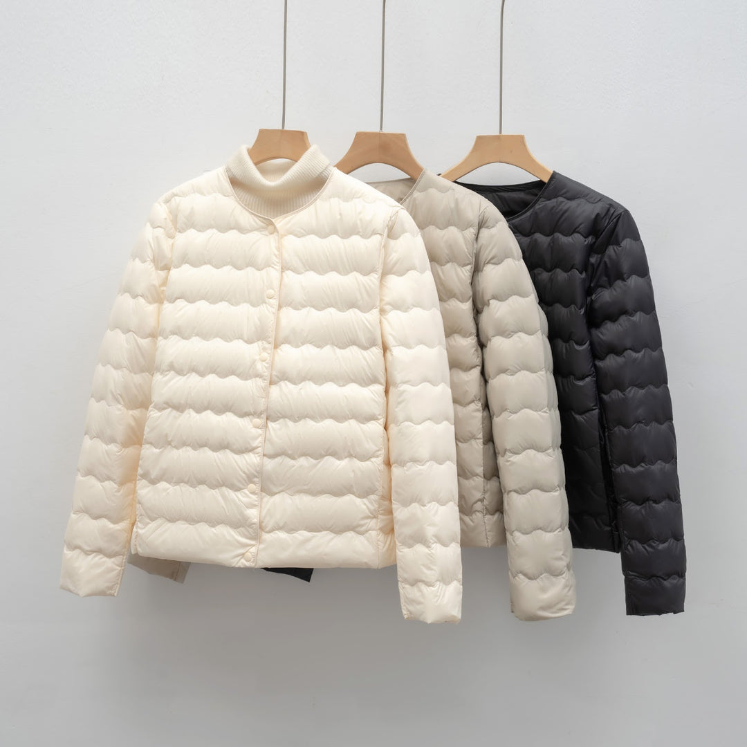 Light women’s down jacket with round neck and wave pattern