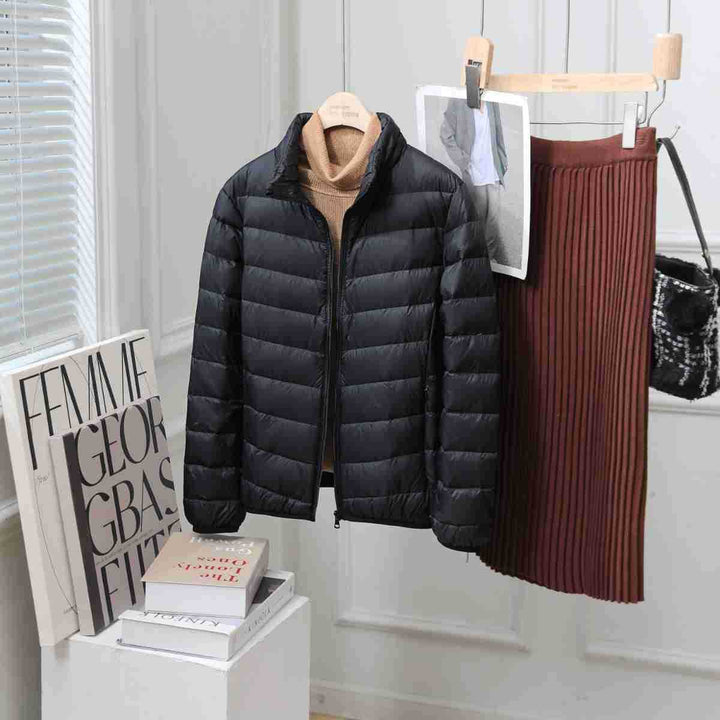 Light women's down jacket with stand-up collar, white duck down