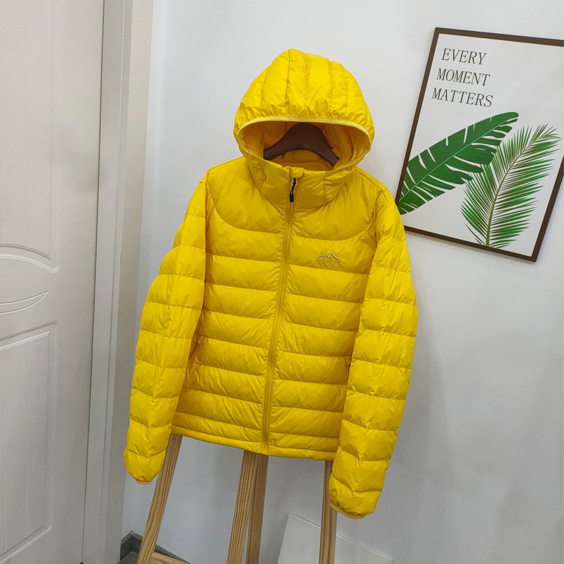 Light women's down jacket with hood, quilted
