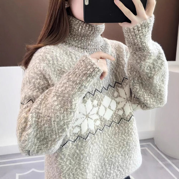 Women's knitted pullover with snowflake pattern and stand-up collar