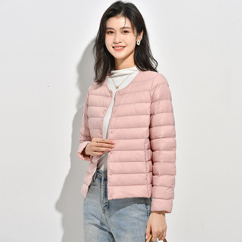 Light women's down jacket, short, as a base layer jacket