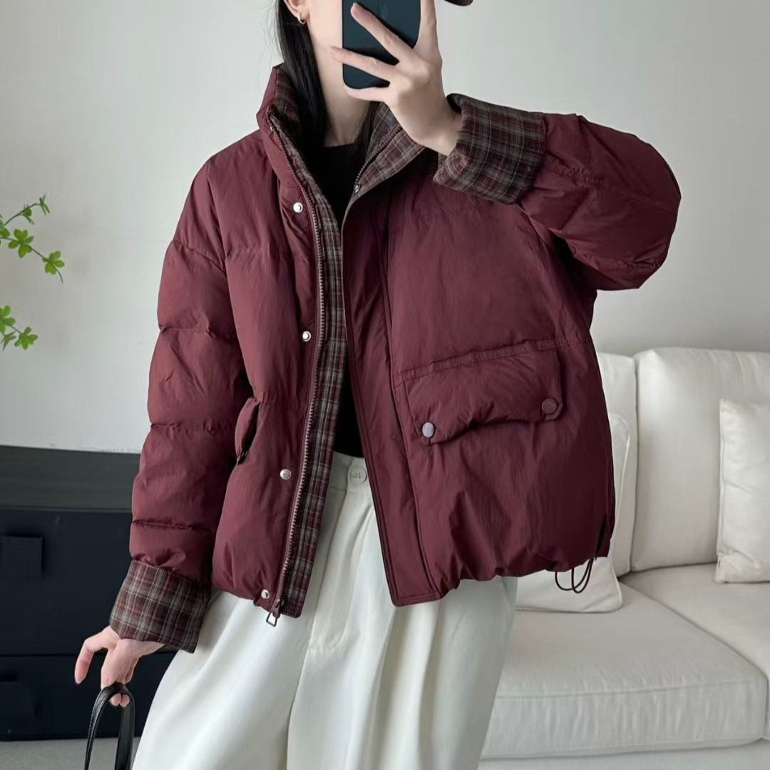Short women's down jacket with high filling volume