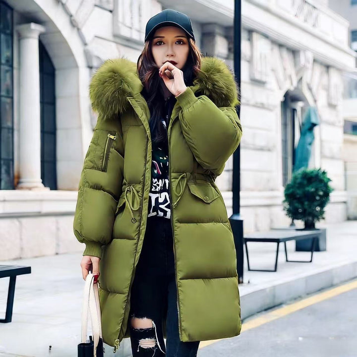 Padded women's winter jacket, mid-length, with fur collar