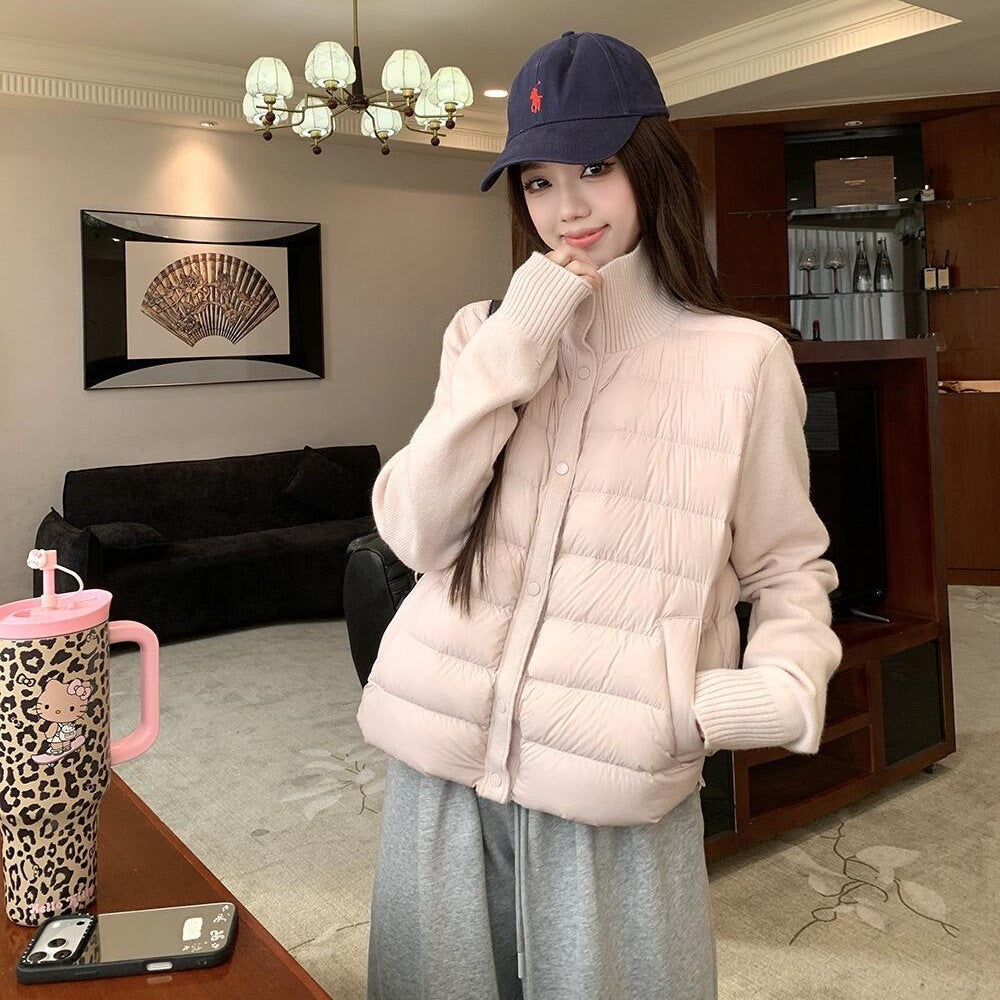 Short women's down jacket with knitted sleeves