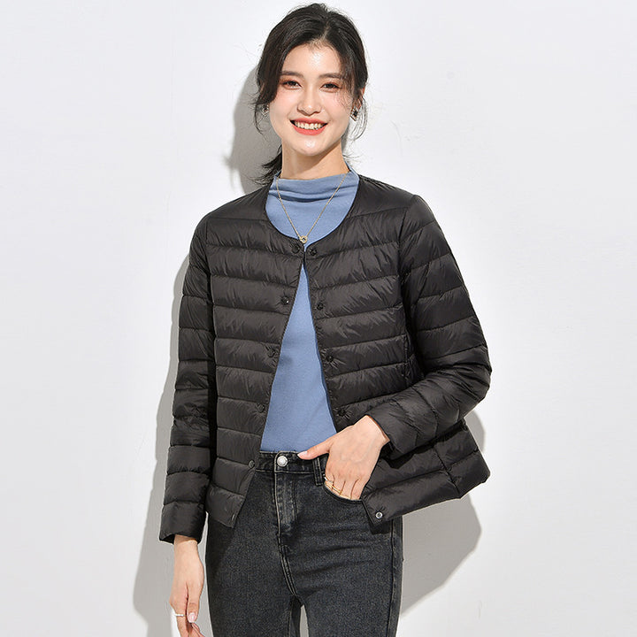 Light women's down jacket, short, as a base layer jacket