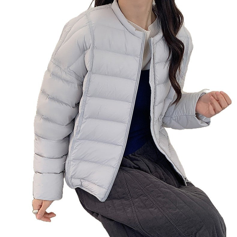 Short women's down jacket, lightweight, loose fit