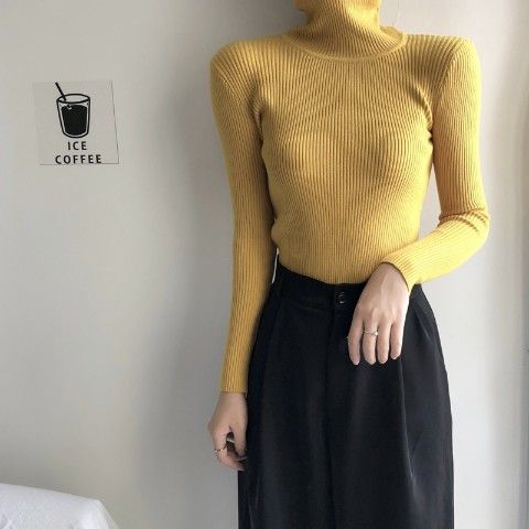 Form-fitting women's turtleneck sweater