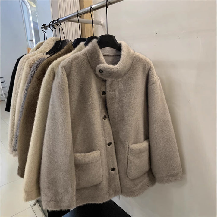 Fashionable faux fur coat, mid-length and lined