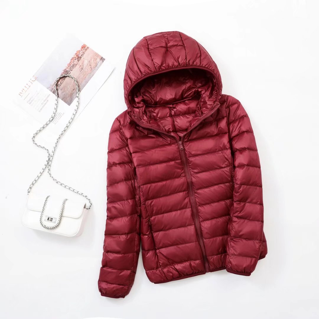 Light women's down jacket with hood, slim fit