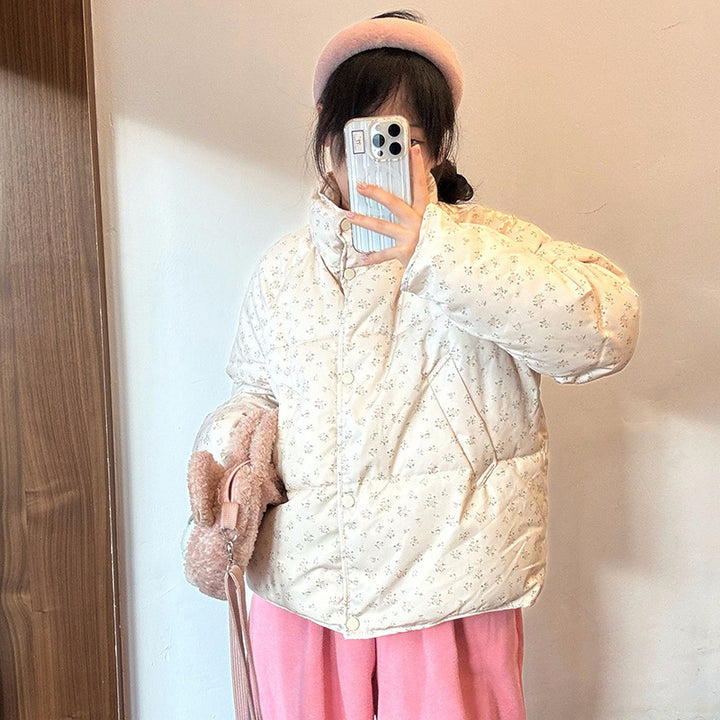 Short women's quilted jacket with floral pattern, oversized cut