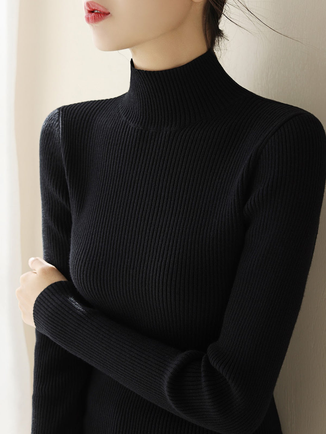 Women's knitted pullover with stand-up collar, slim fit