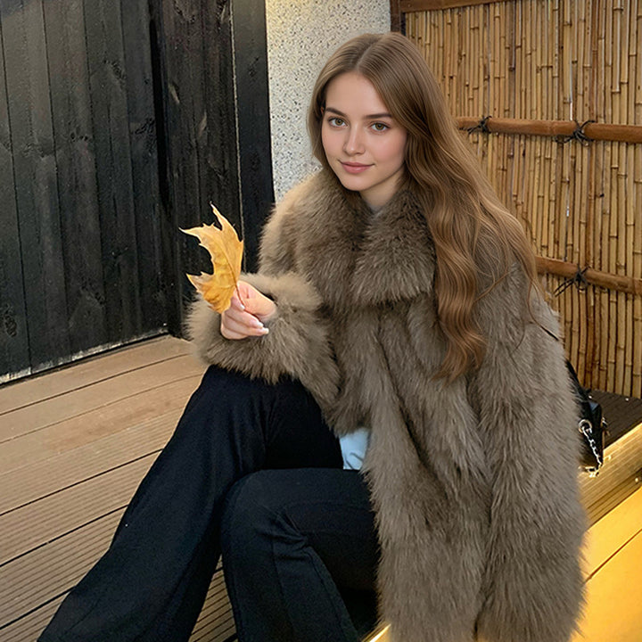 Ladies' medium-length faux fur coat