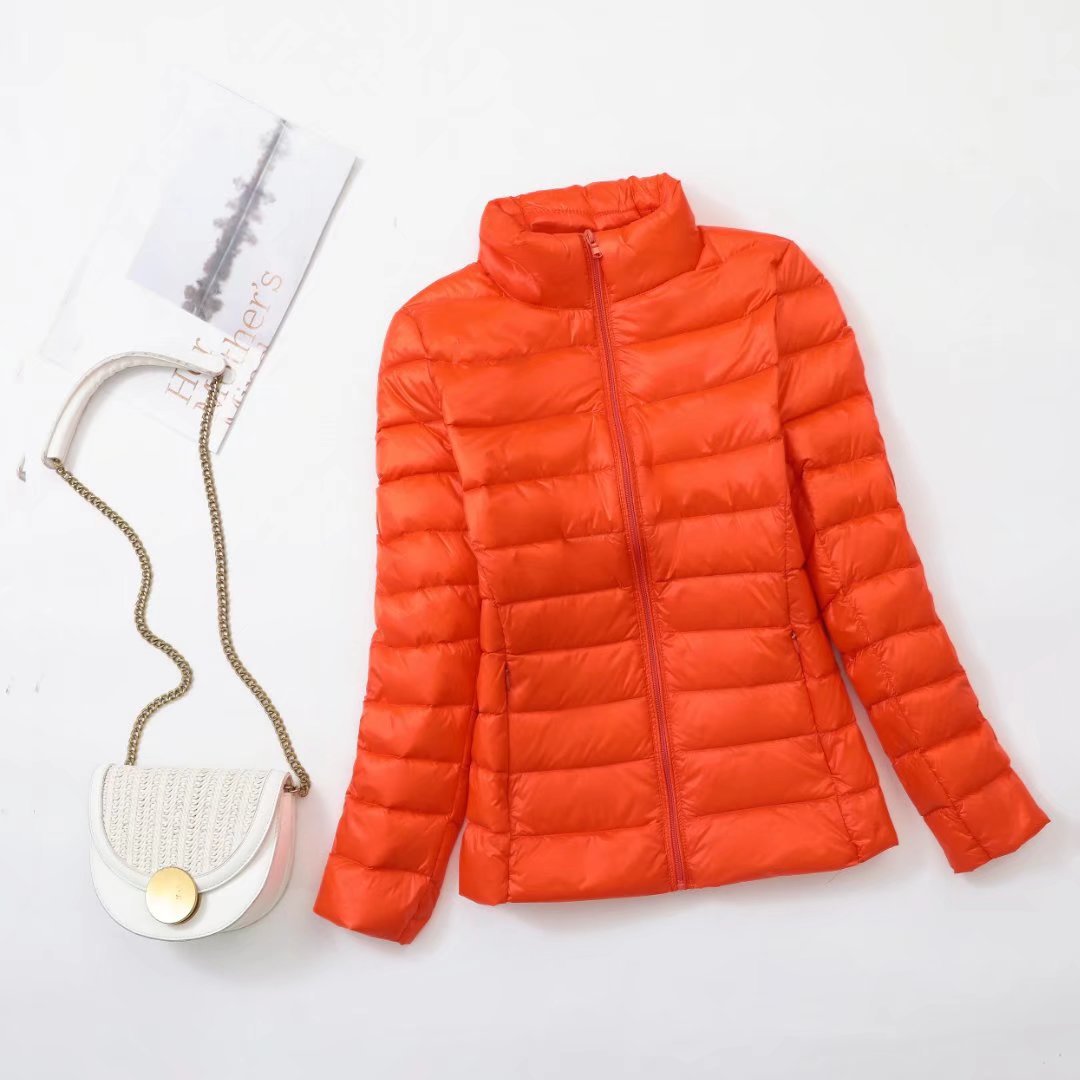 Light women's down jacket, stand-up collar, slim fit