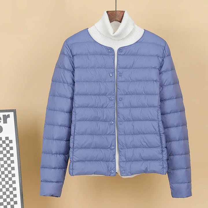 Lightweight, short down jacket as an underlayer