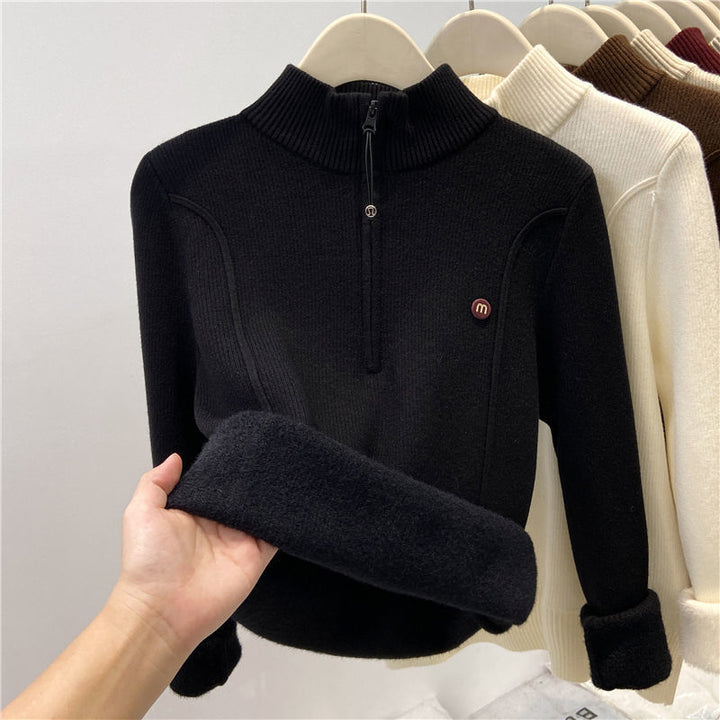 Padded women's knitted sweater with zipper and stand-up collar