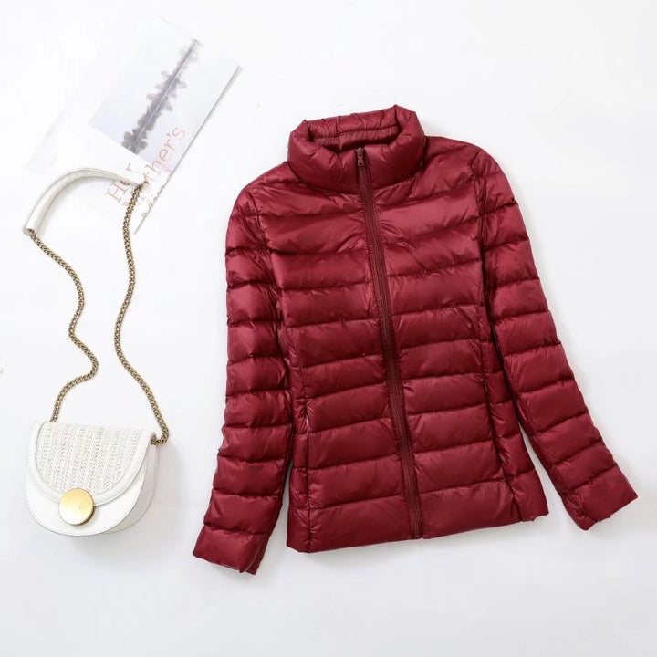 Light women's down jacket, stand-up collar, slim fit