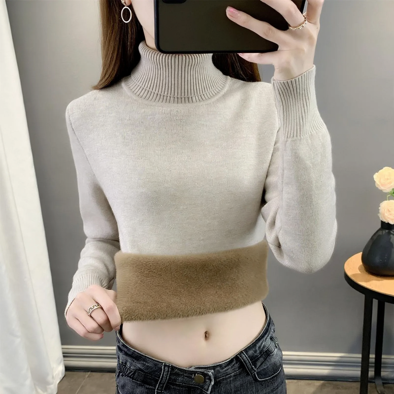 Padded women's knitted sweater for winter