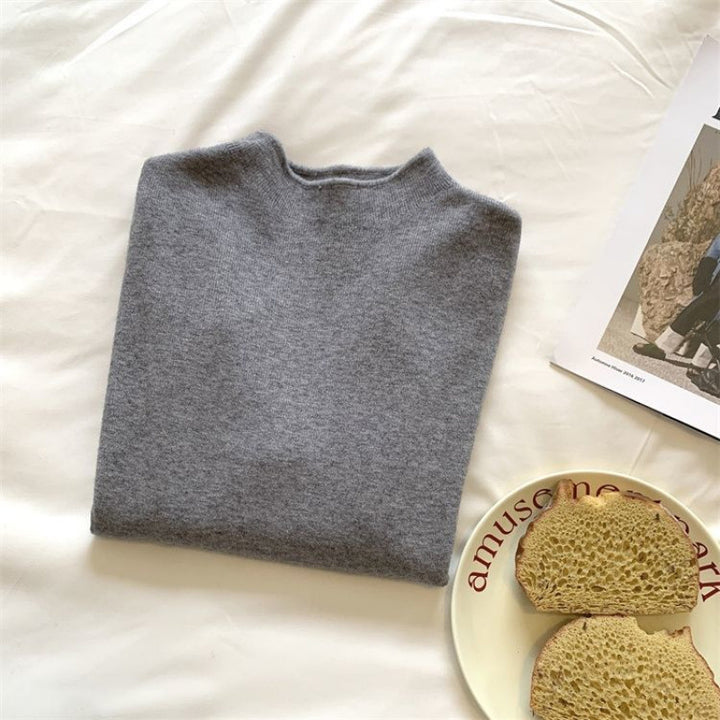 Women’s knit sweater with stand-up collar