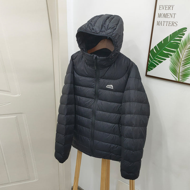 Light women's down jacket with hood, quilted