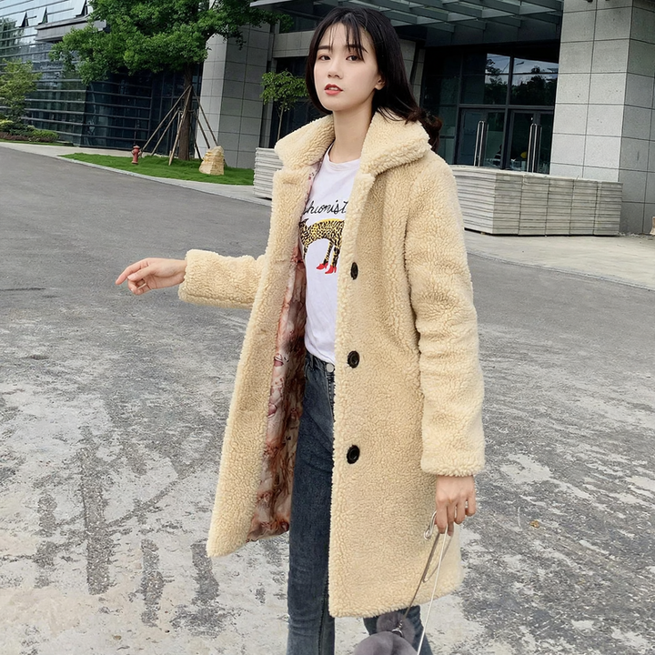Women's coat made of sheared lambskin with stand-up collar