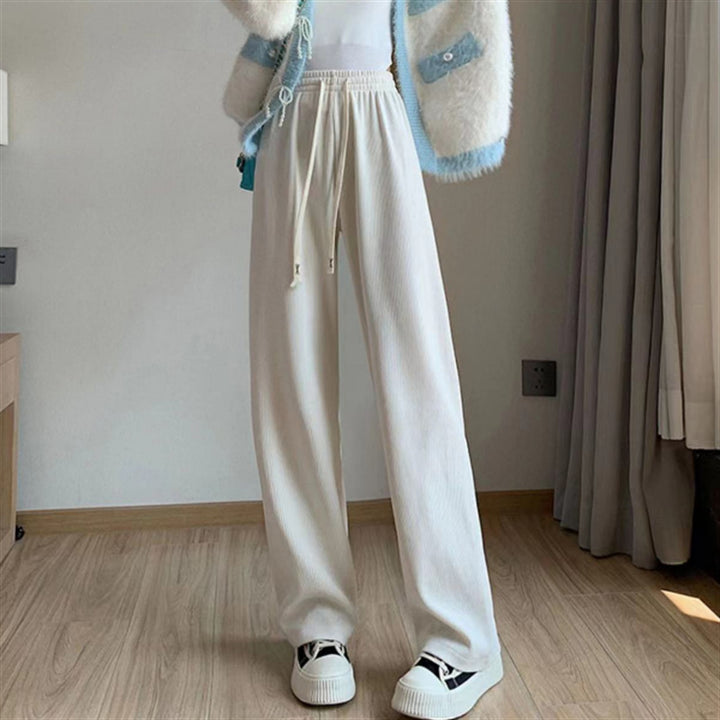 Women’s corduroy pants with a high waistband, straight-cut